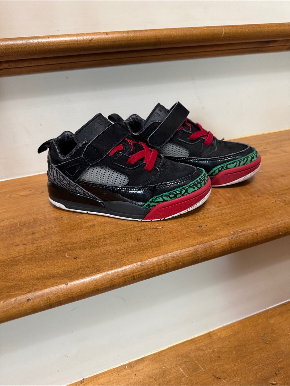 Jordan Kids Black Sneakers with Red and Green Accents